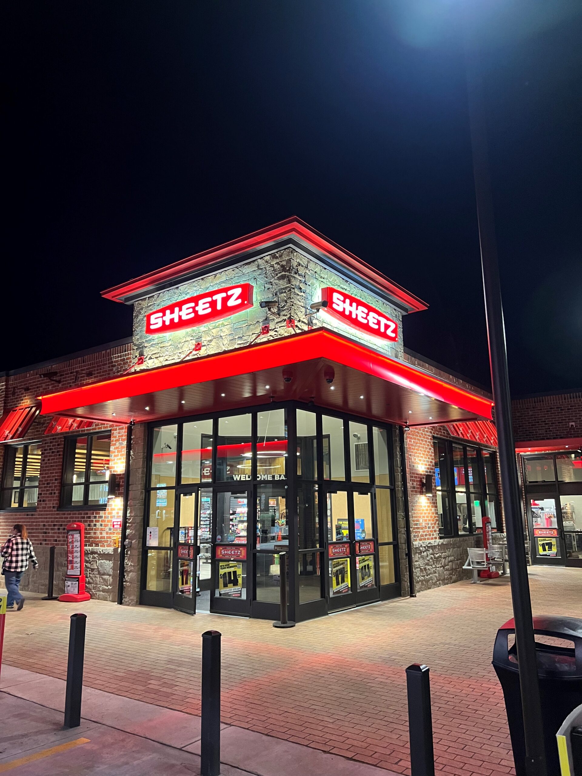 This image depicts a Sheetz canopy with classic red branding and integrated deck lighting to enhance style and safety. The canopy was made by Mapes. 