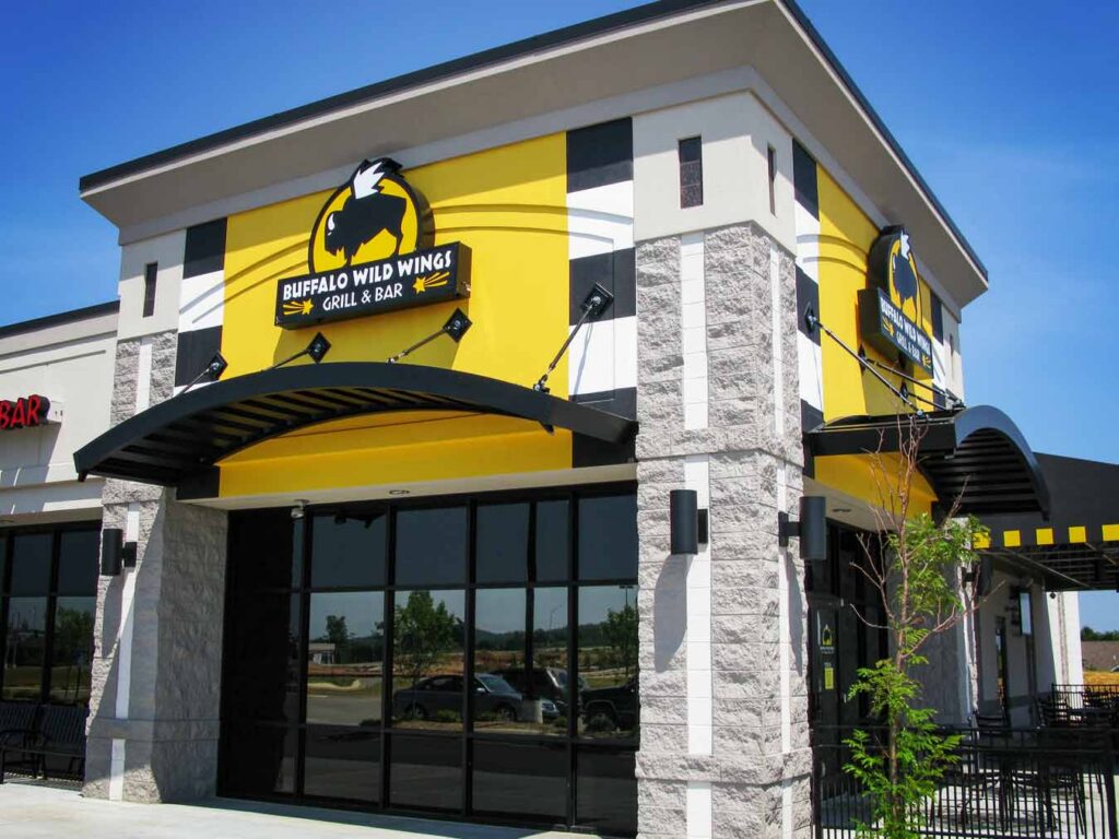 Blueprint for Success: 5 Questions to Guide an Exterior Commercial Renovation A Buffalo Wild Wings utilizes Mapes’ Super Lumideck canopies for sleek, protected entryways and outdoor dining areas.